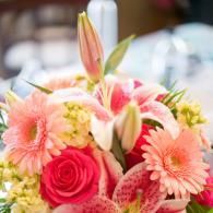 Pink and white floral bouquet with roses, lilies, and gerbera daisies