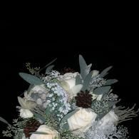 Muted white and gray floral bouquet with eucalyptus on a black background