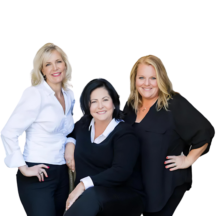 Three women are posing for a picture and smiling for the camera