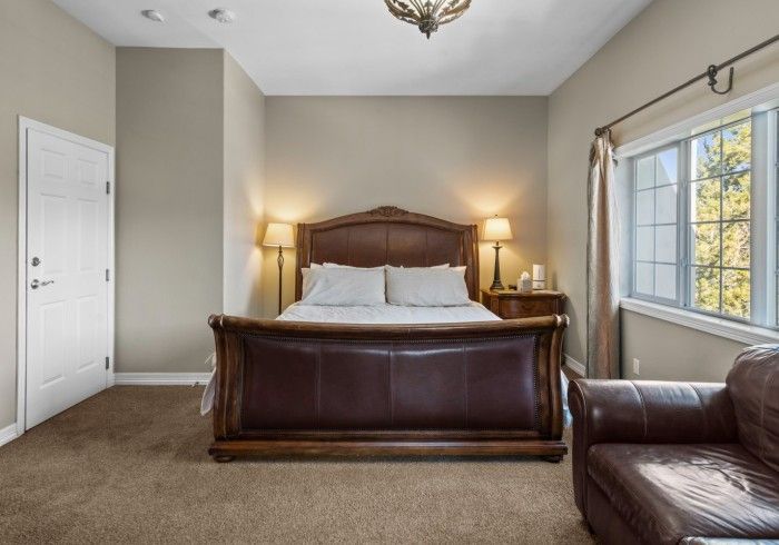 There is a large bed in the middle of the room.