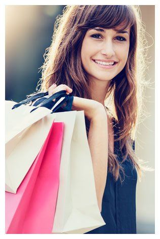 young woman smiling while shopping