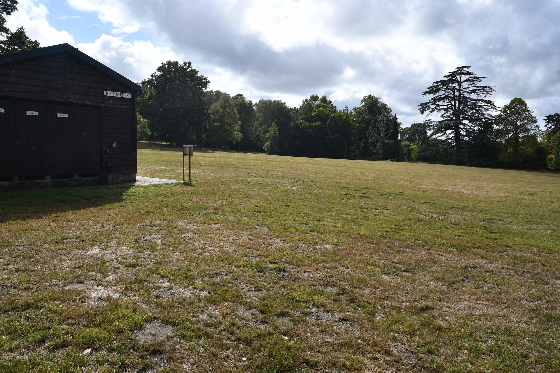 Campsite field with hard shelter and toilets