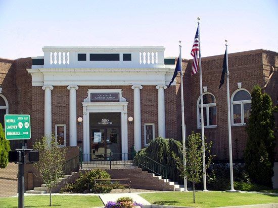Flagpole outside a building