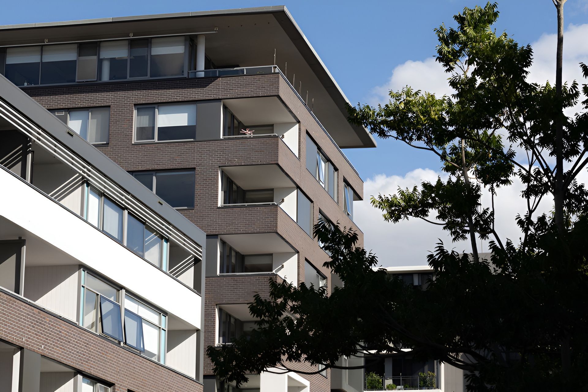 Modern Apartment Building With Balconies — Affordable Underpinning Solutions In Parramatta, NSW