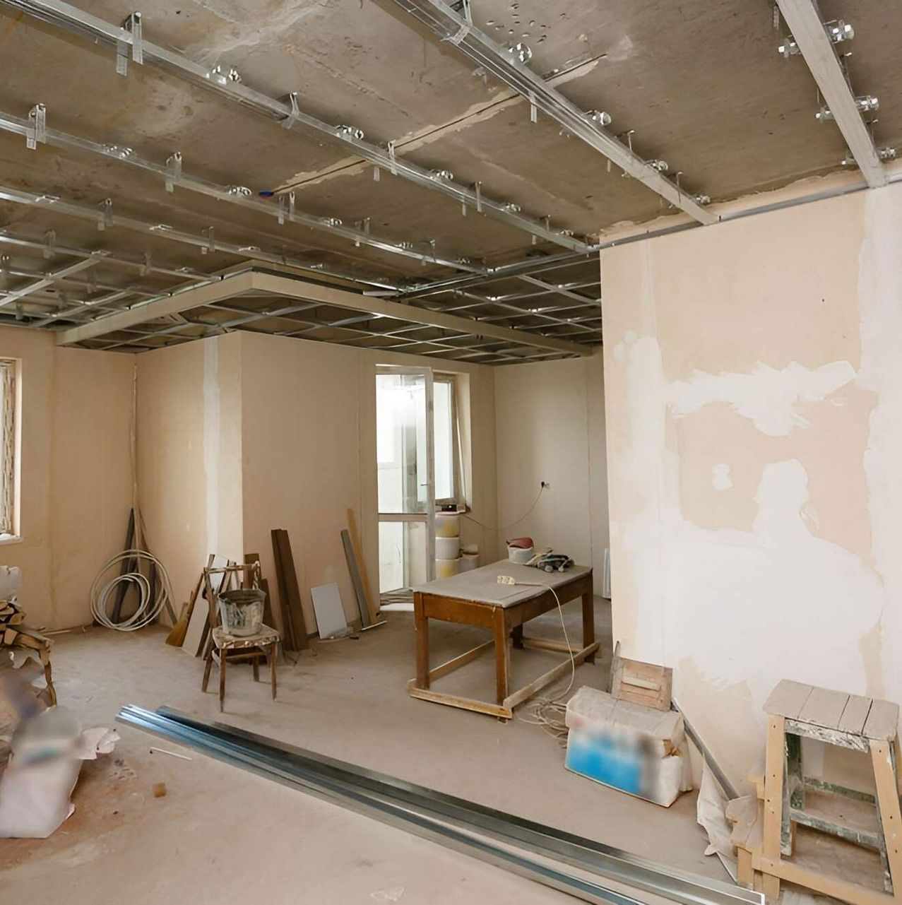 A Room That Is Being Remodelled With A Table And Chairs In It — Affordable Underpinning Solutions In Shell Cove, NSW