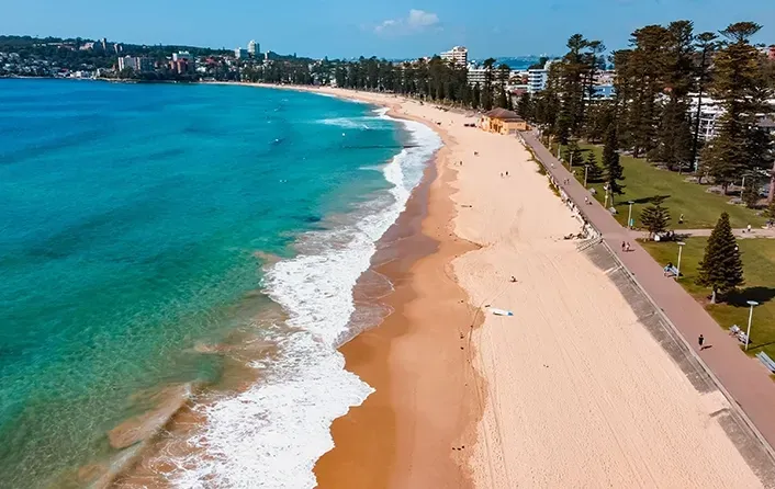 An Aerial View of Manly Beach and Parkland — Affordable Underpinning Solutions In Manly, NSW
