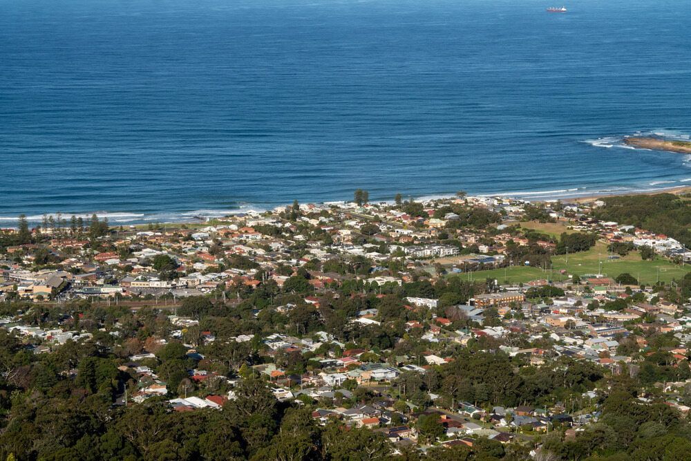 An Aerial View Of A City Next To The Ocean — Affordable Underpinning Solutions In Thirroul, NSW