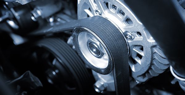 Up close of belts inside vehicle | Olmsted Auto Care
