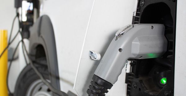 Electric Vehicle getting charged | Olmsted Auto Care