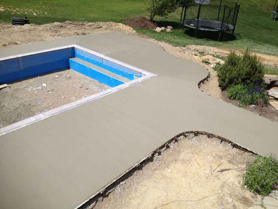 Empty pool under maintenance - stamped concrete in Churubusco, IN