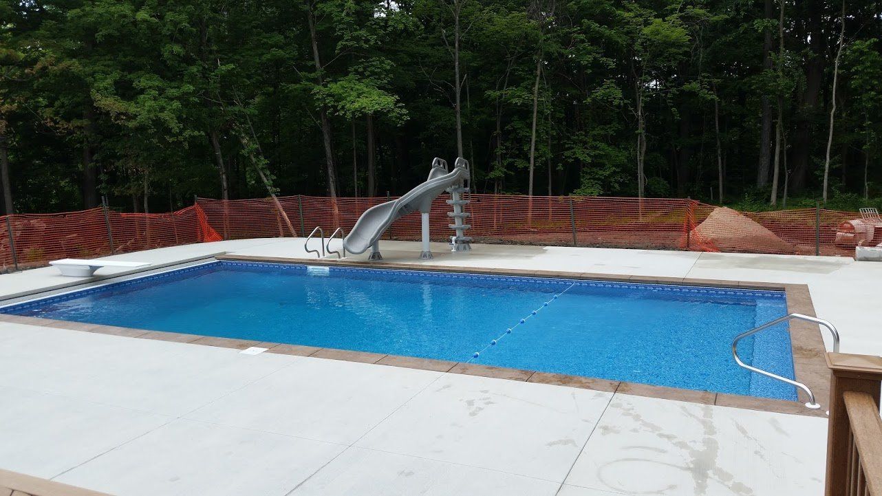 Pool with Slide under construction - Pool Installation in Churubusco, IN