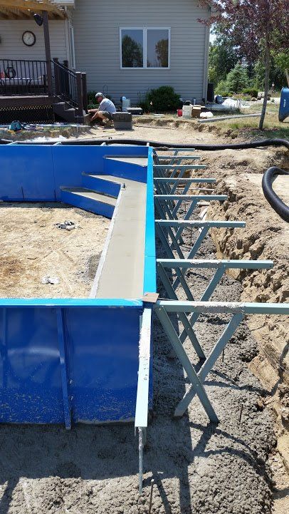 Side of the Pool under construction - Pool Installation in Churubusco, IN