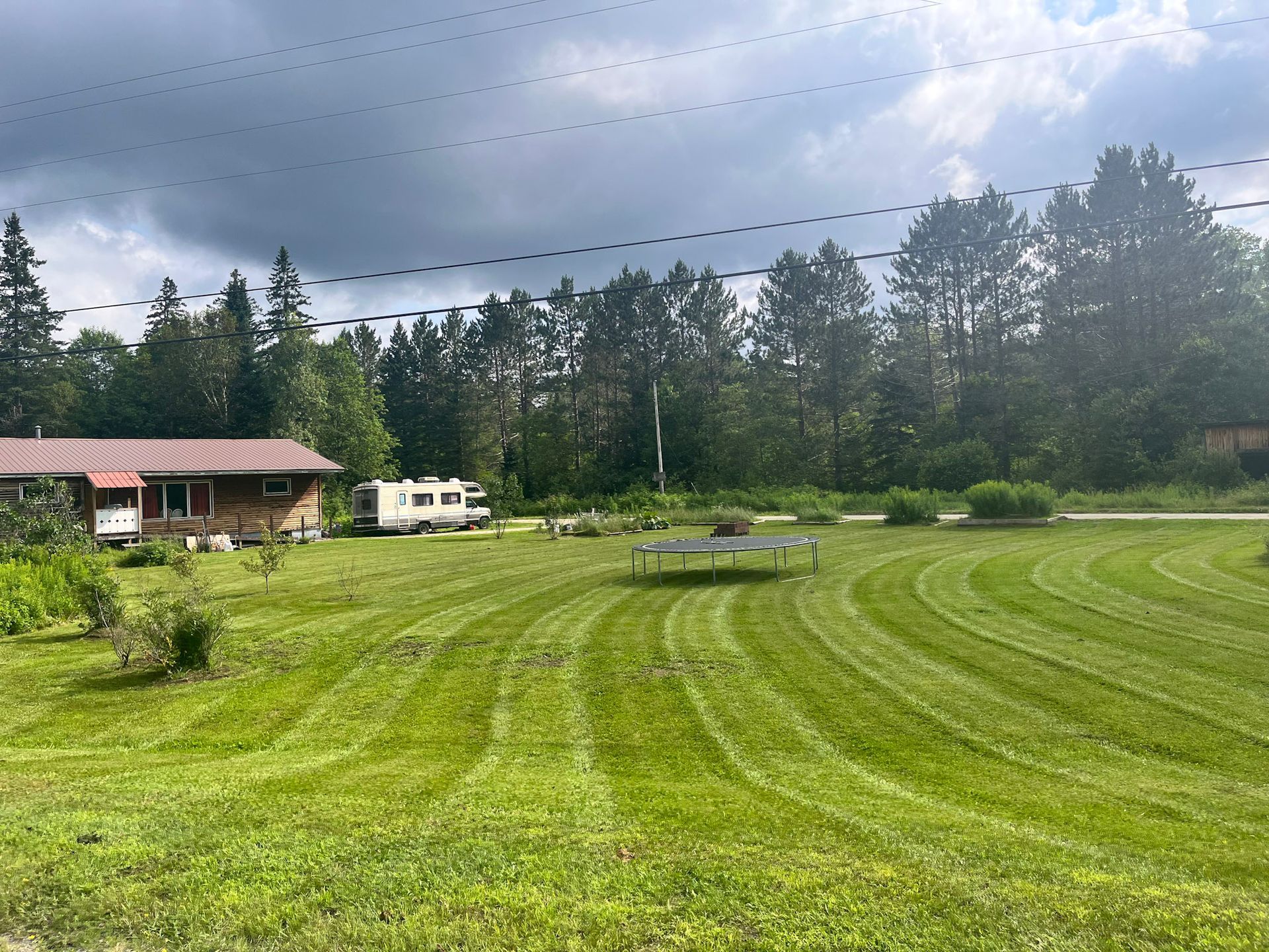NEK Tree Workz maintaining a residential lawn