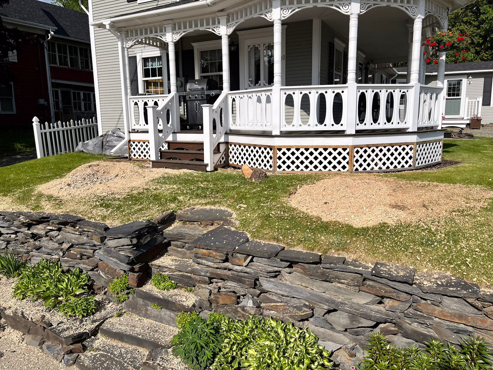 NEK Tree Workz cleaning up after a tree was removed