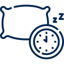 כרית ליד שעון, המציינת את זמן השינה. סמלי 