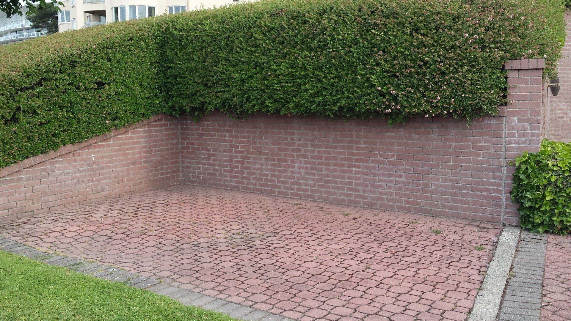 A short curved brick retaining wall