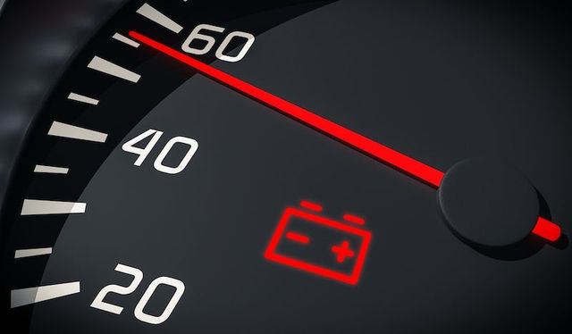The battery warning light is on.