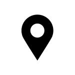 a black map pin with a circle in the middle on a white background