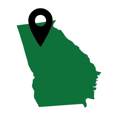 a green map of georgia with a black location pin on it