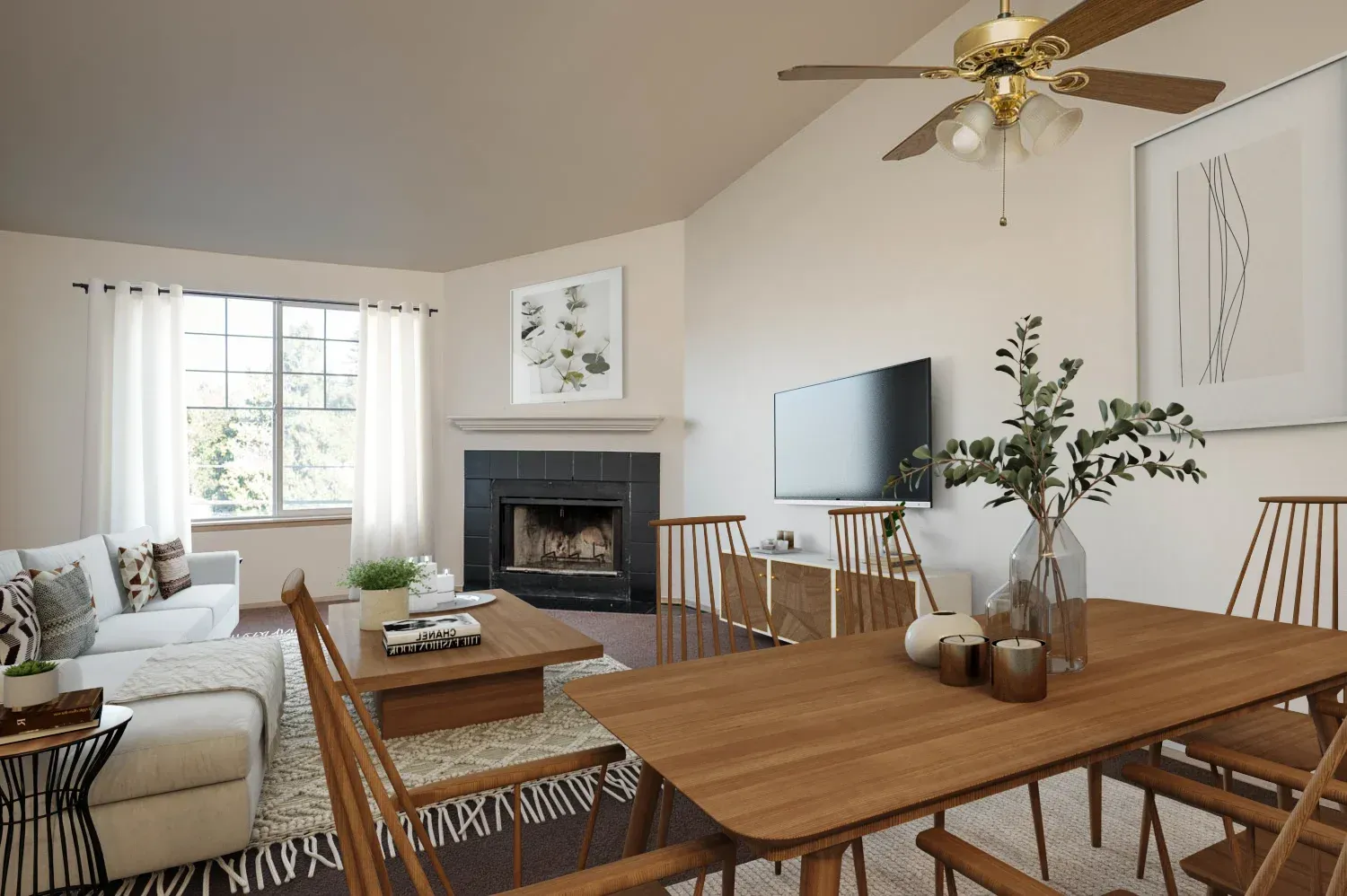Living room with dining area: white walls, fireplace, wooden table, chairs, and sofa.