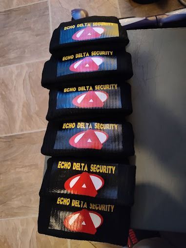 Stacked black fabric items with 