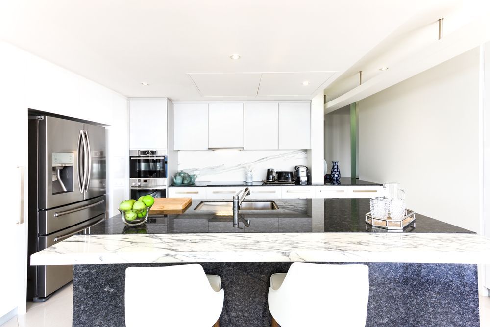 Modern Kitchen With White Cabinets, Marble Backsplash — Affordable Tiles and Pavers In Morisset, NSW