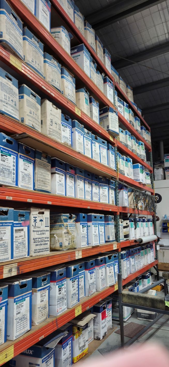 A warehouse filled with shelves filled with lots of boxes.