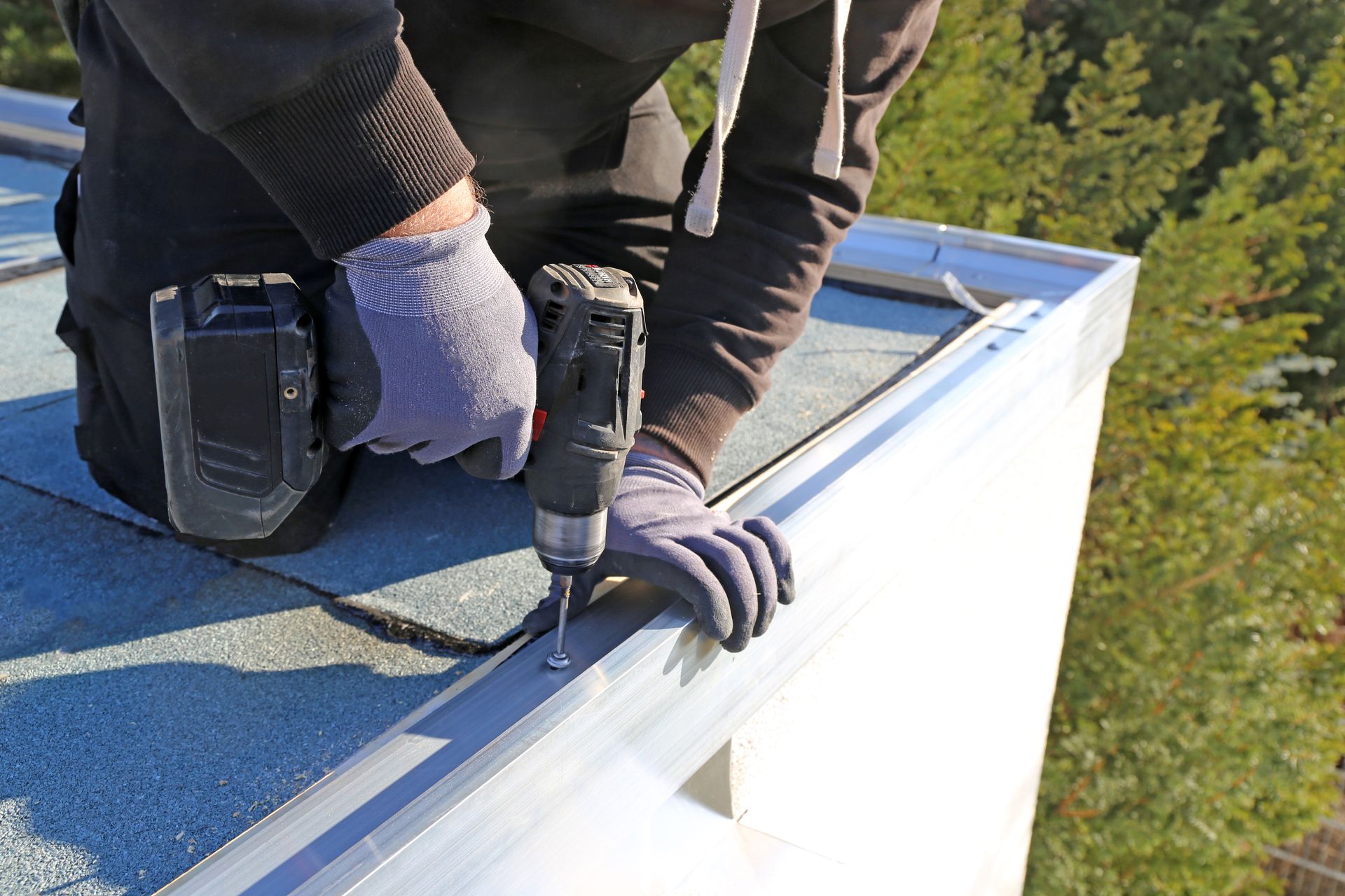 a man working on the roof