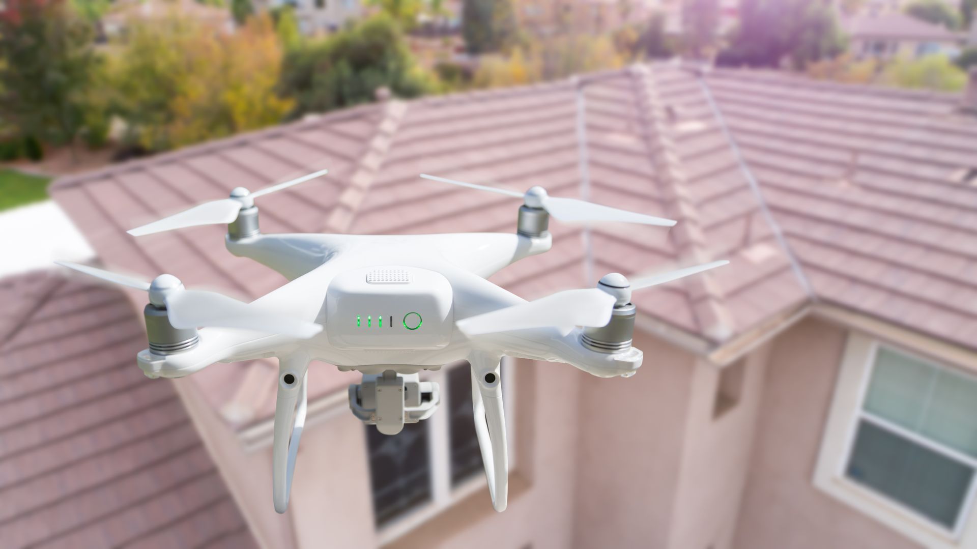 a drone inspecting roof