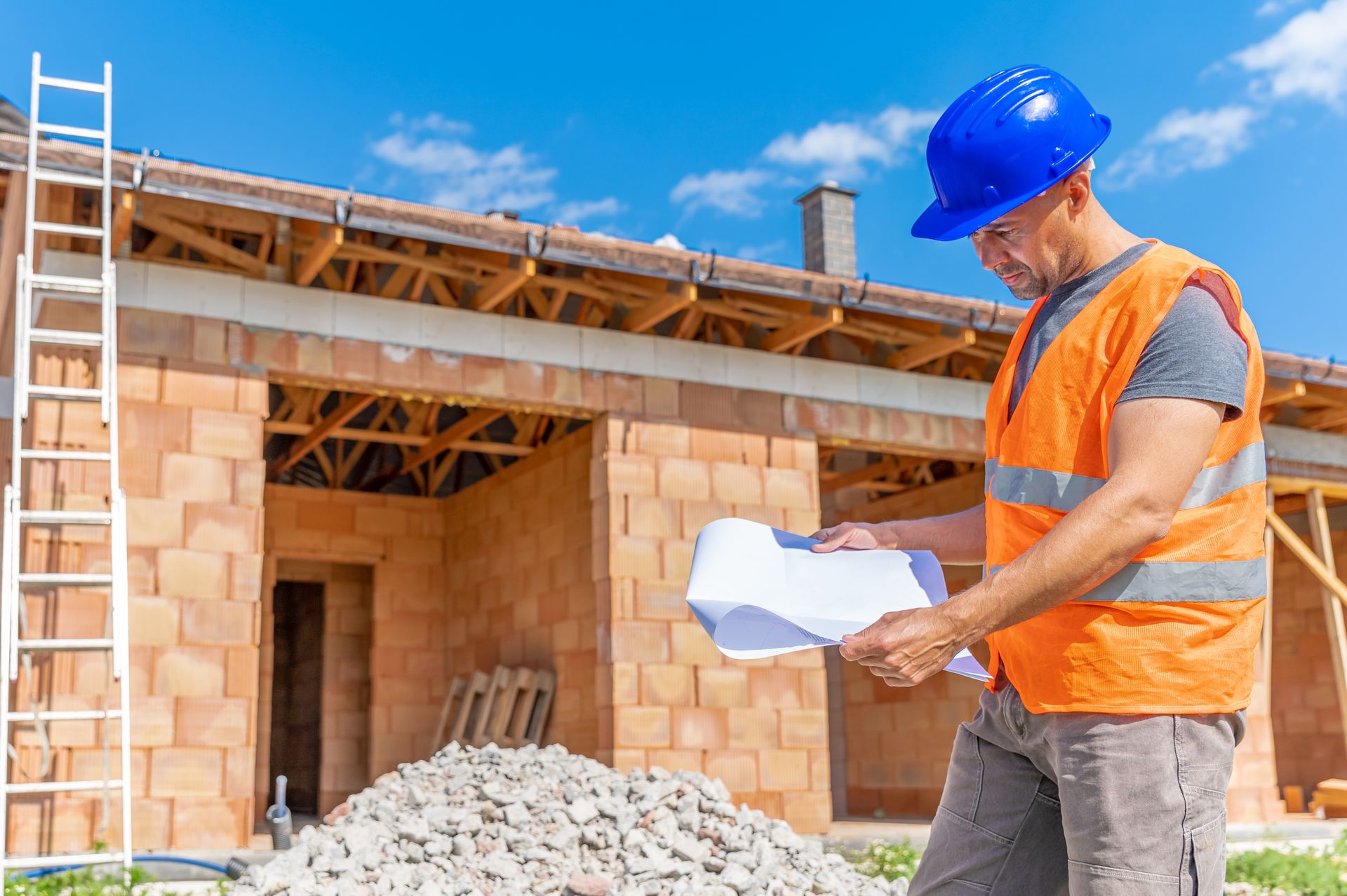 a man standing in front of the construction site