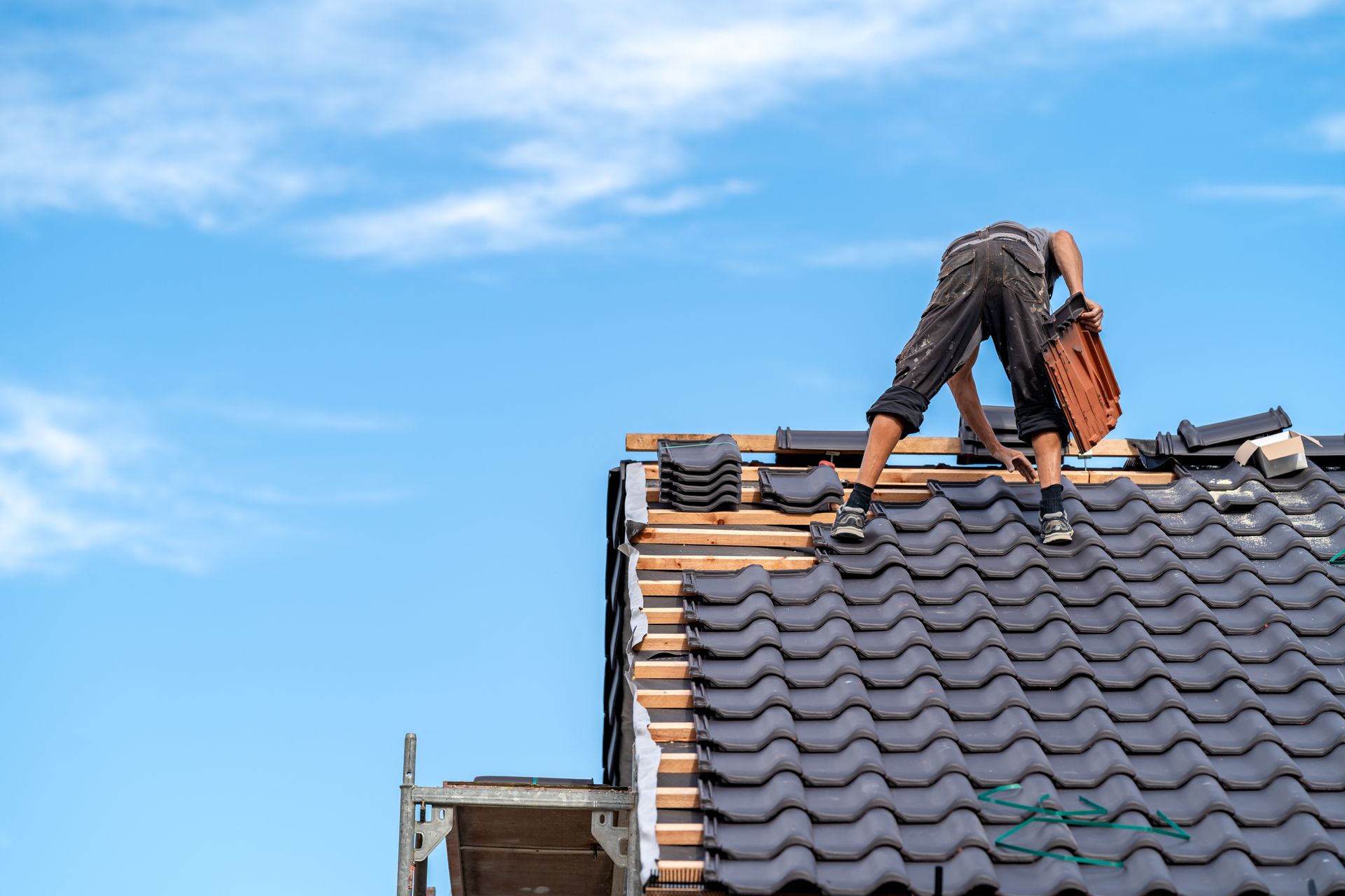 a man working on the roof