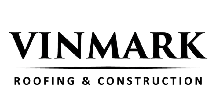 The logo for vinmark roofing and construction is black and white.
