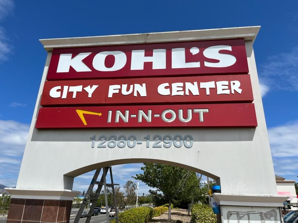 A sign for abc supply co. inc. sits in the grass