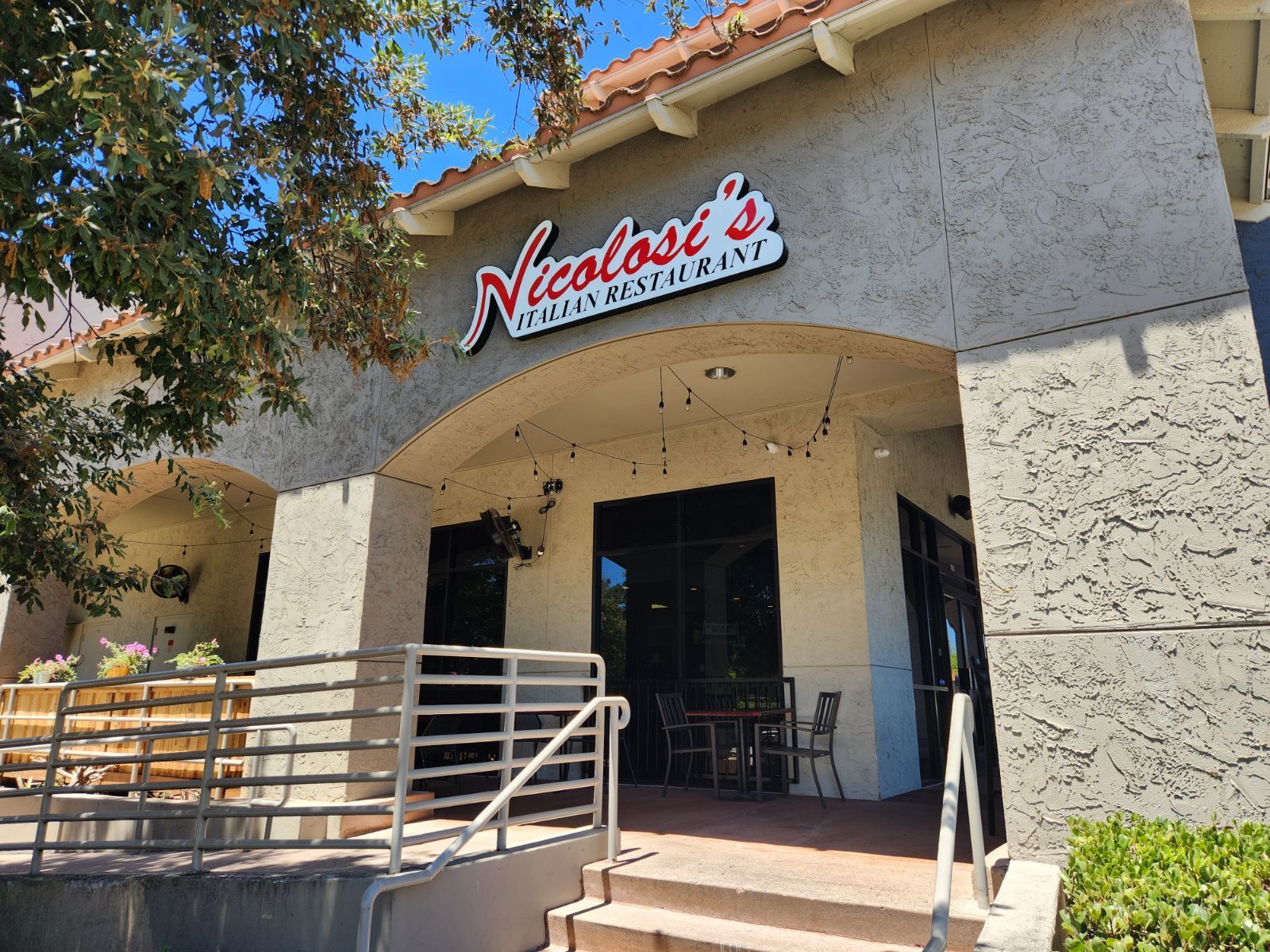 A restaurant with a sign that says nicolasi 's italian restaurant