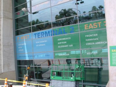 A building with a sign that says east terminal 2 on it