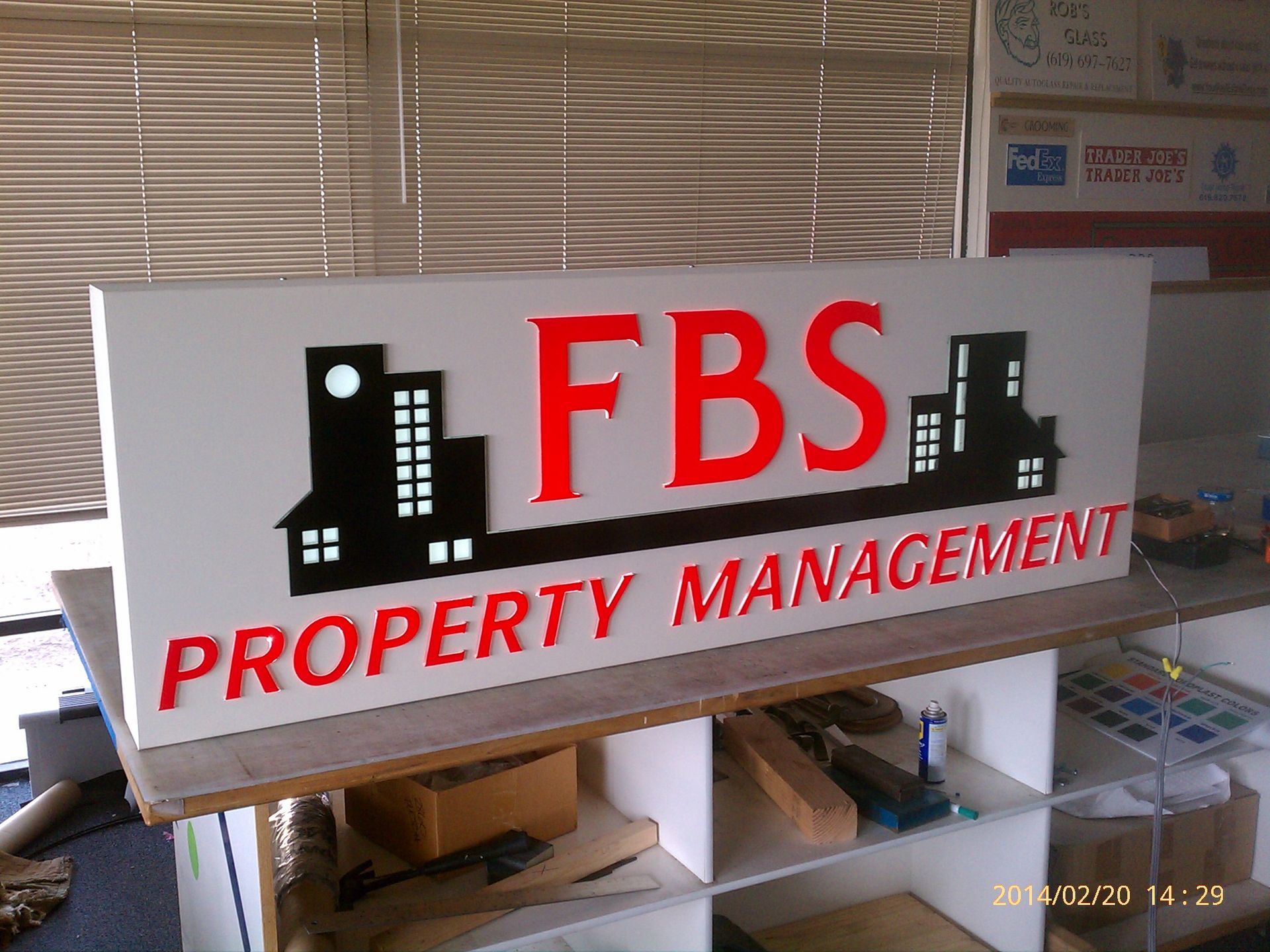 A sign that says fbs property management on it