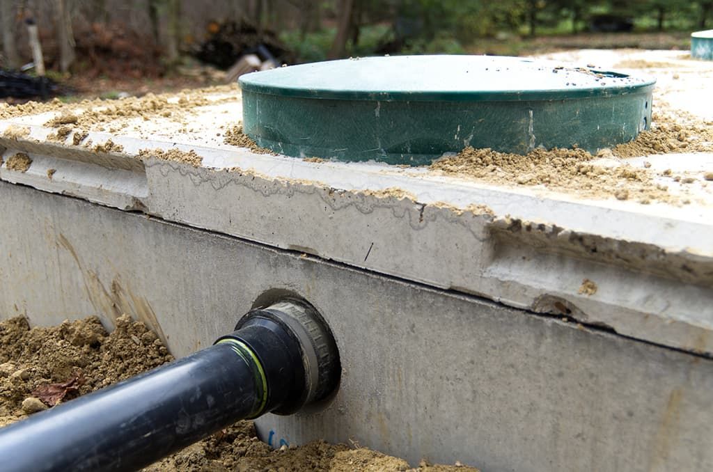 Repairing a concrete septic tank in Tuscaloosa, AL.