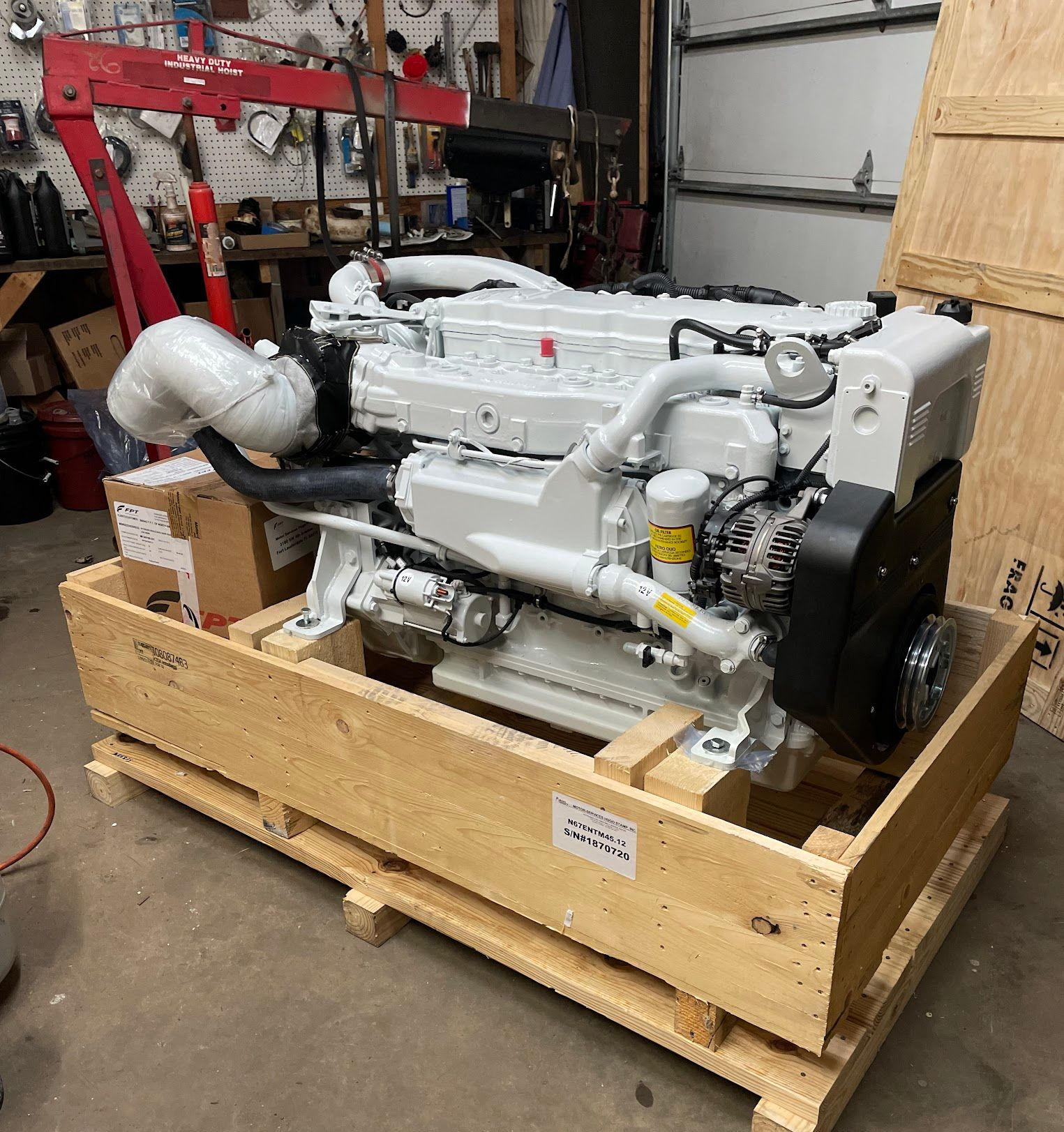 An aerial view of a large wave in the ocean.