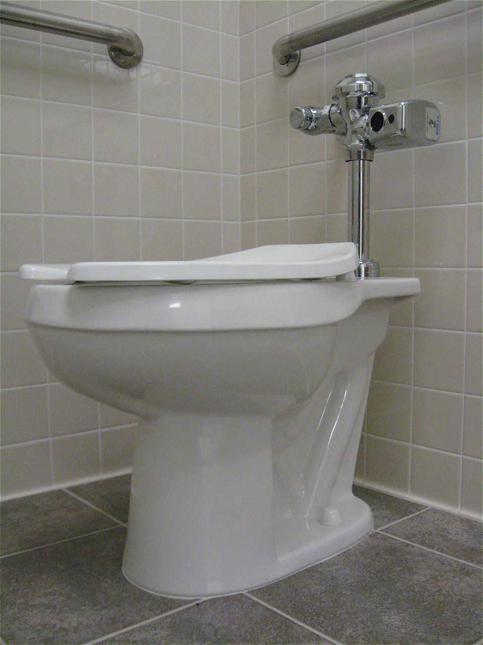 A White Toilet Is Sitting In The Corner Of A Bathroom | Wichita, KS | David Lies Plumbing