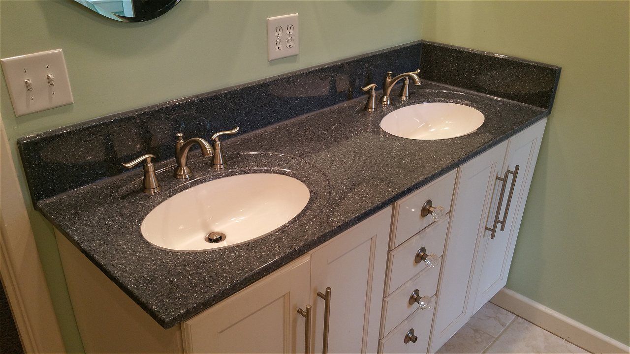 A Bathroom With Two Sinks And A Mirror | Wichita, KS | David Lies Plumbing