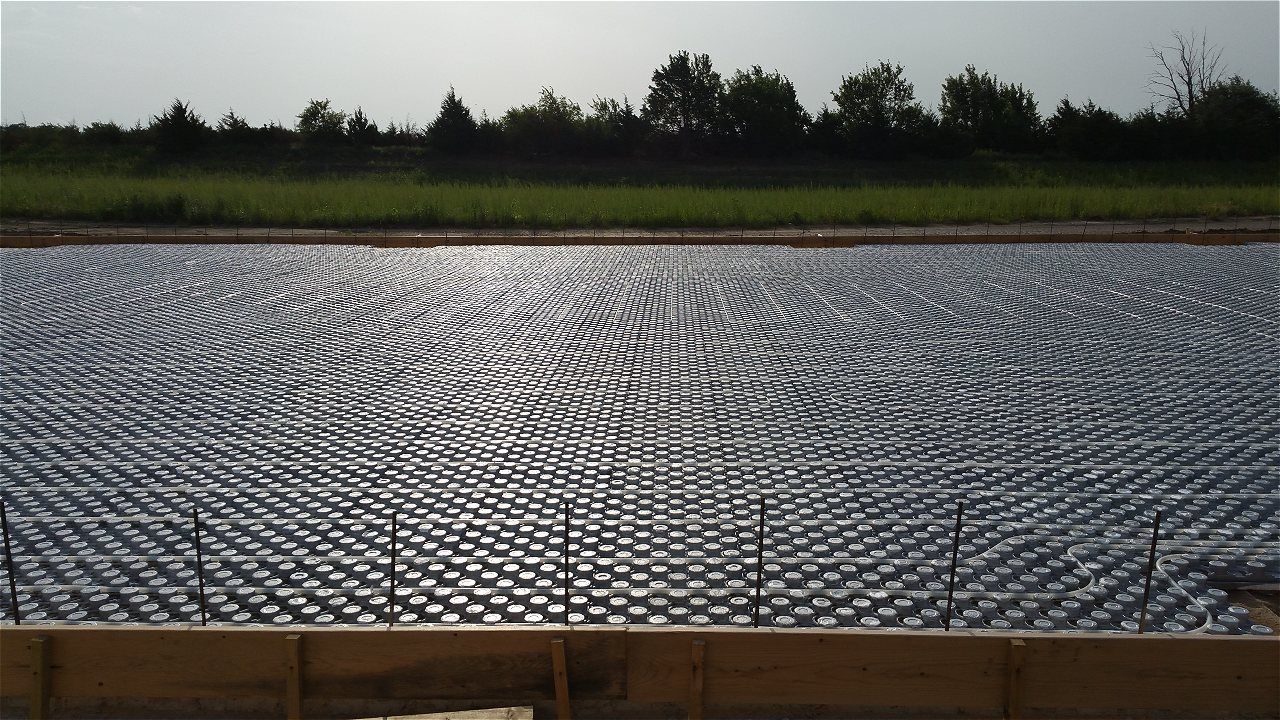 A Large Body Of Water With Trees In The Background | Wichita, KS | David Lies Plumbing