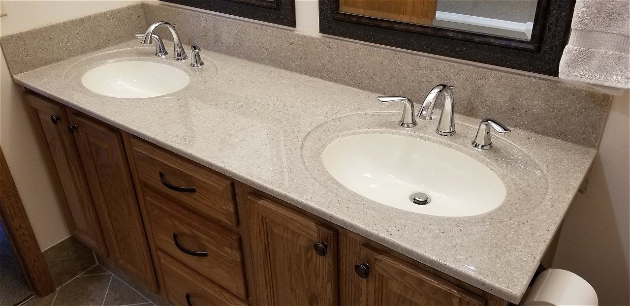 A Bathroom With Two Sinks And A Mirror | Wichita, KS | David Lies Plumbing