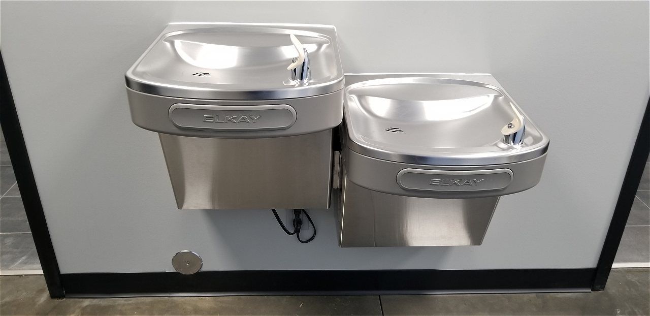 Two Stainless Steel Water Fountains Are Mounted To A Wall | Wichita, KS | David Lies Plumbing