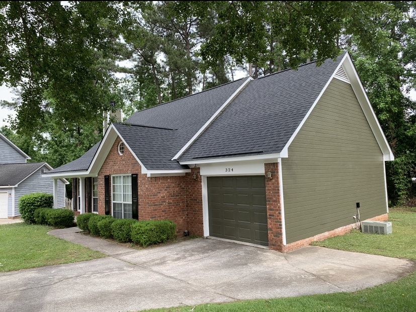 A white box with a brown tape that says packhelp on it