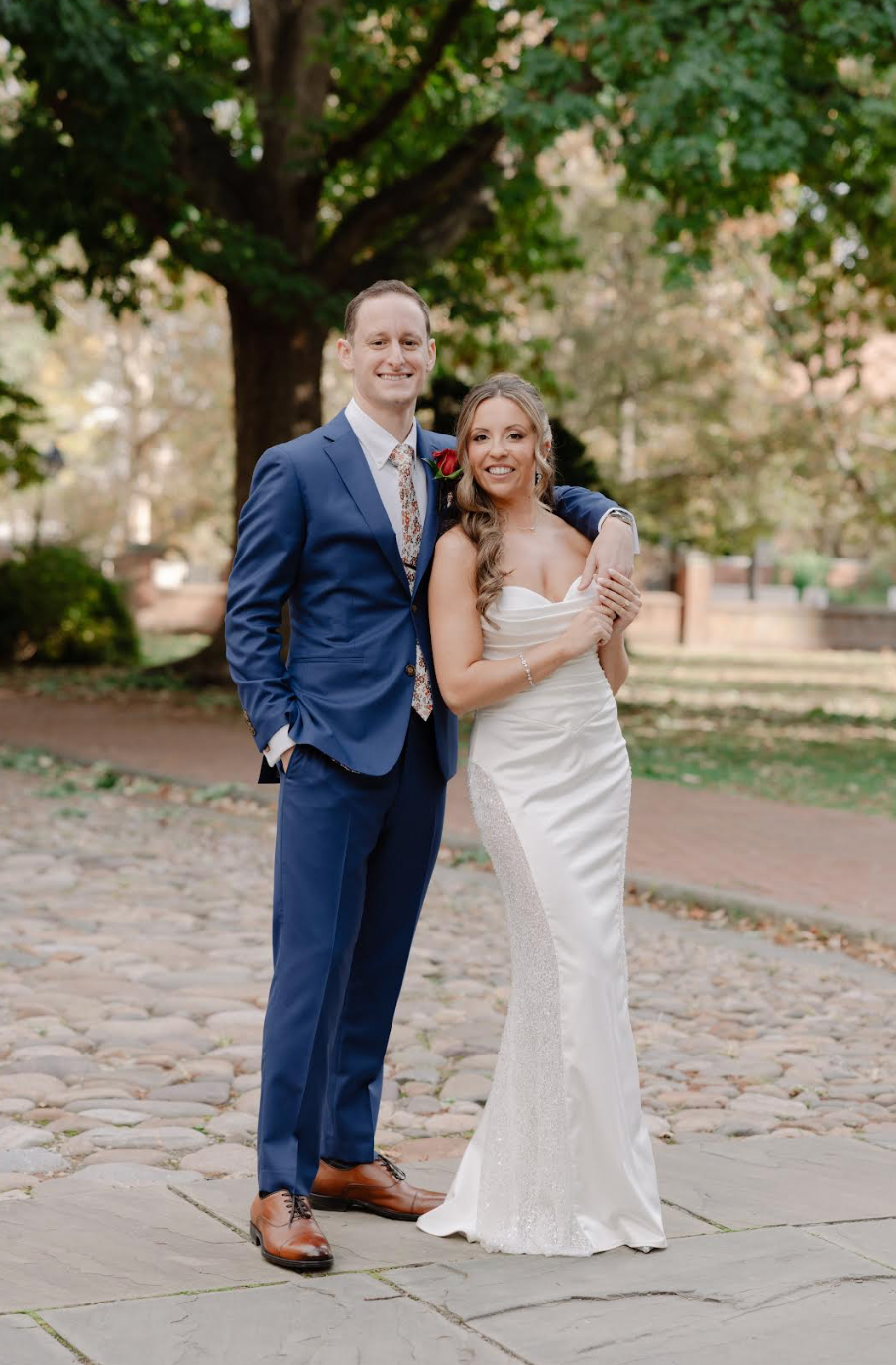 A group of people dressed as santa claus and mrs. claus are posing for a picture on a plane.