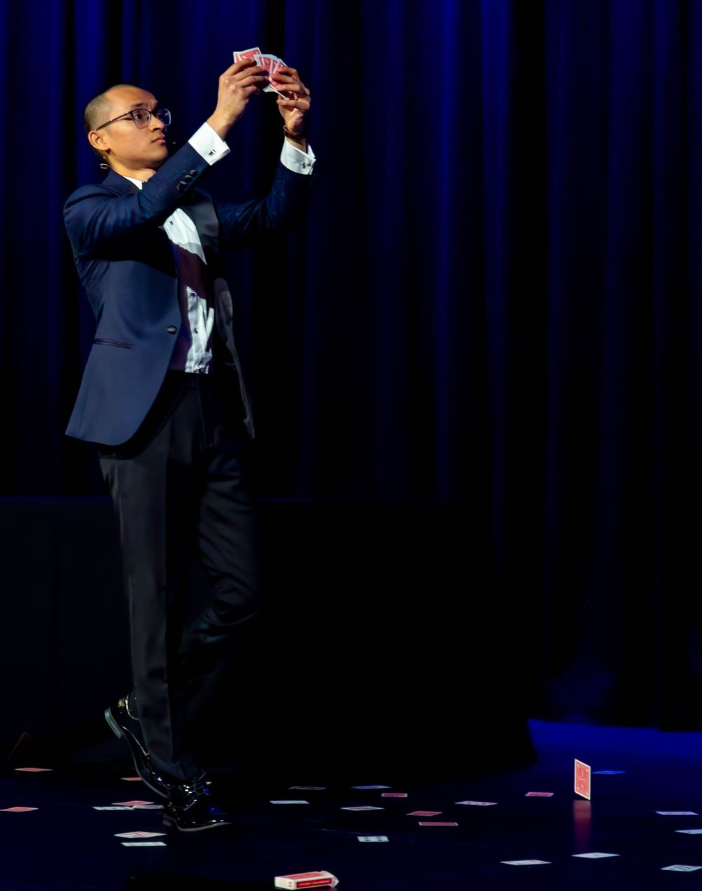 Corporate magician Adelaide performing stage magic at corporate event