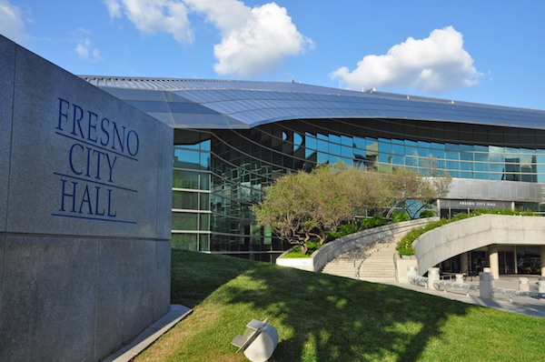 A large building with a sign that says fresno city hall