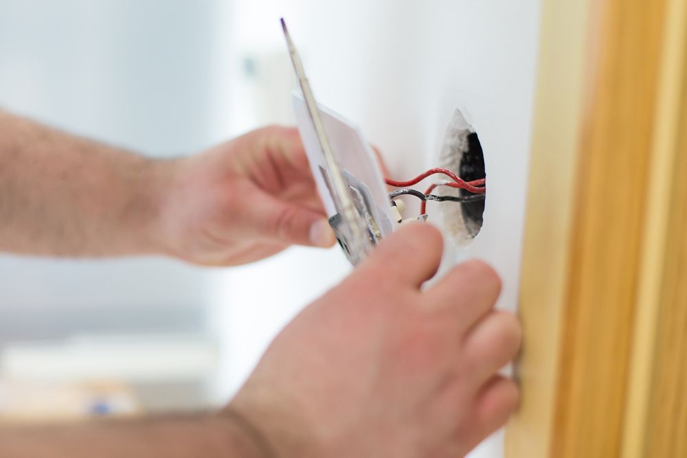 Installing Light Switch — Electrical Services in Broadbeach, QLD