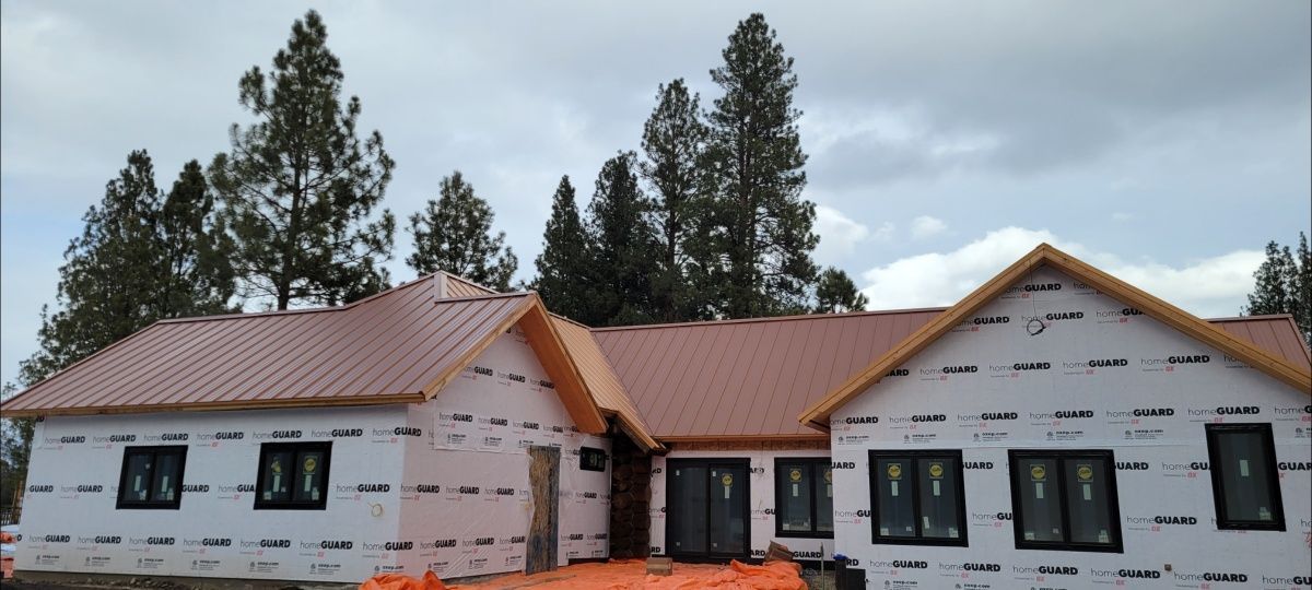 kings commercial roofing llc - metal roof installation - new construction house in montana
