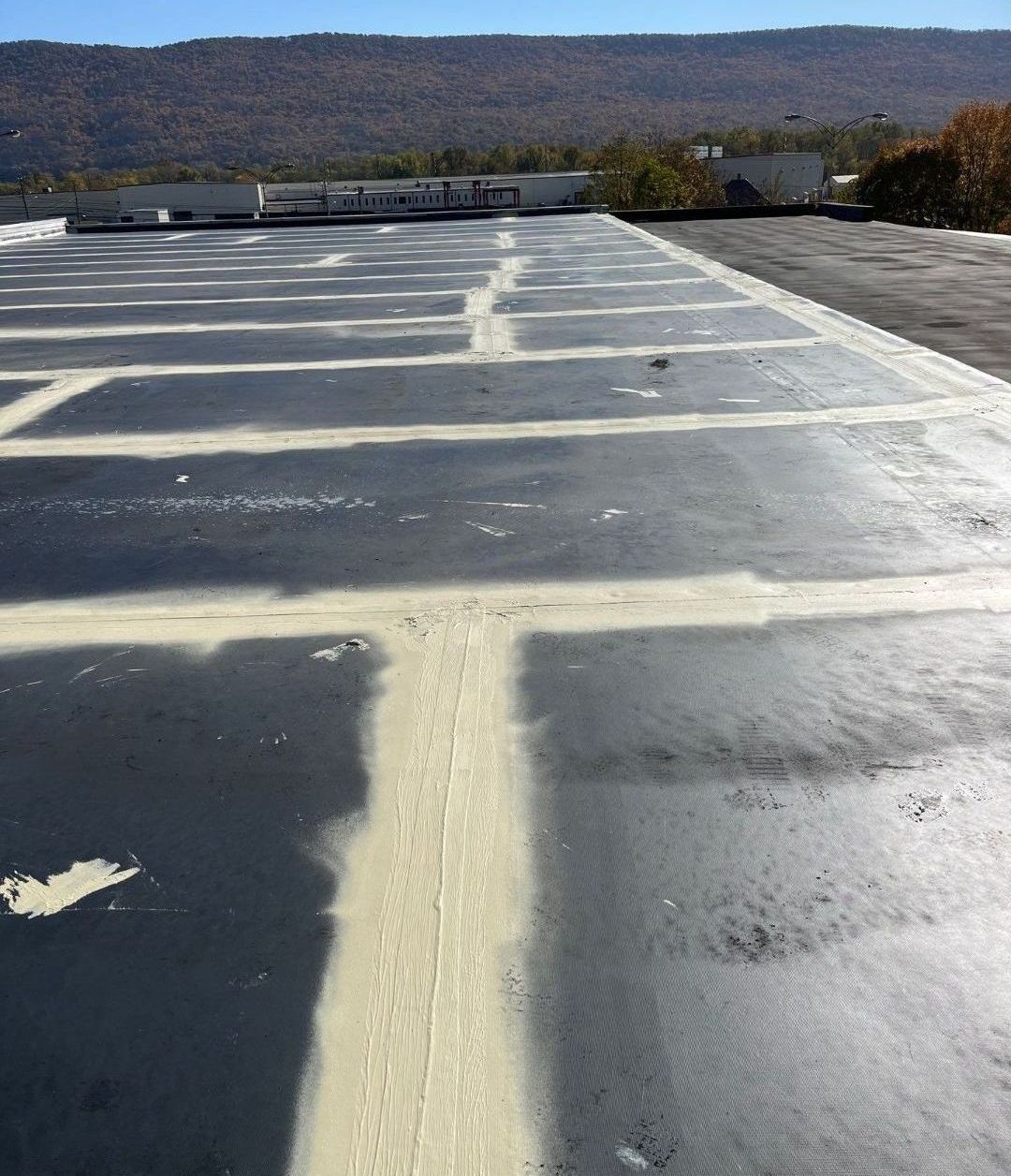 Kings Commercial Roofing LLC, EPDM Roofing, roof restoration spray coating